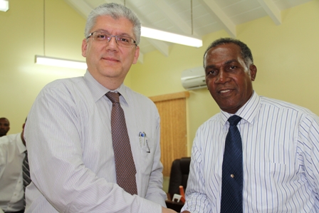 Division Chief of the International Monetary Fund’s Western Hemispheric Department Mr. George Tsibouris (left) and Premier of Nevis and Minister of Finance Hon. Vance Amory